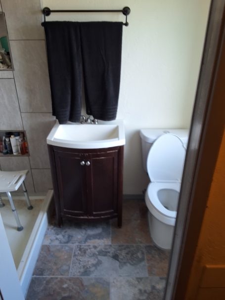 Bathroom vanity and toilet, mid-project